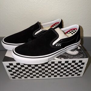 Vans Men's Black and White Slip-On Sneakers with PopCush